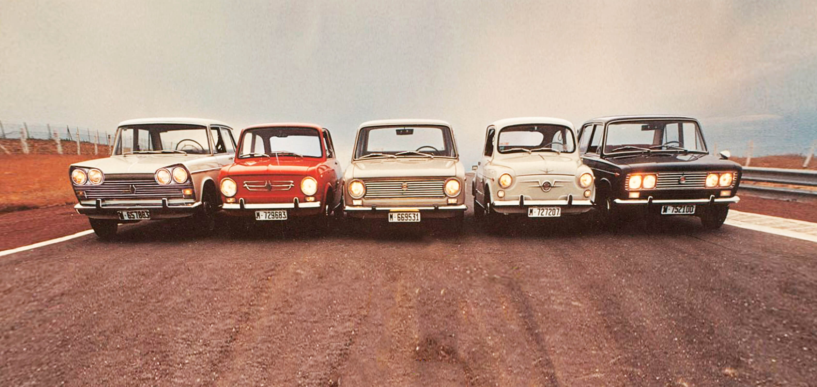 Shot of vintage SEAT cars on street