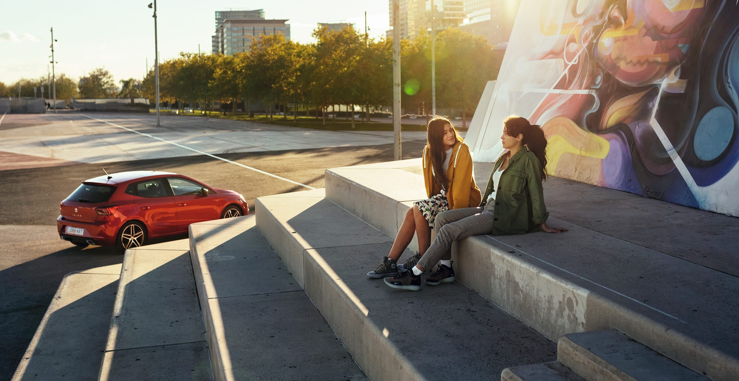 SEAT new car services maintenance WoF checks – man and woman sunbathing sitting down in the mountains