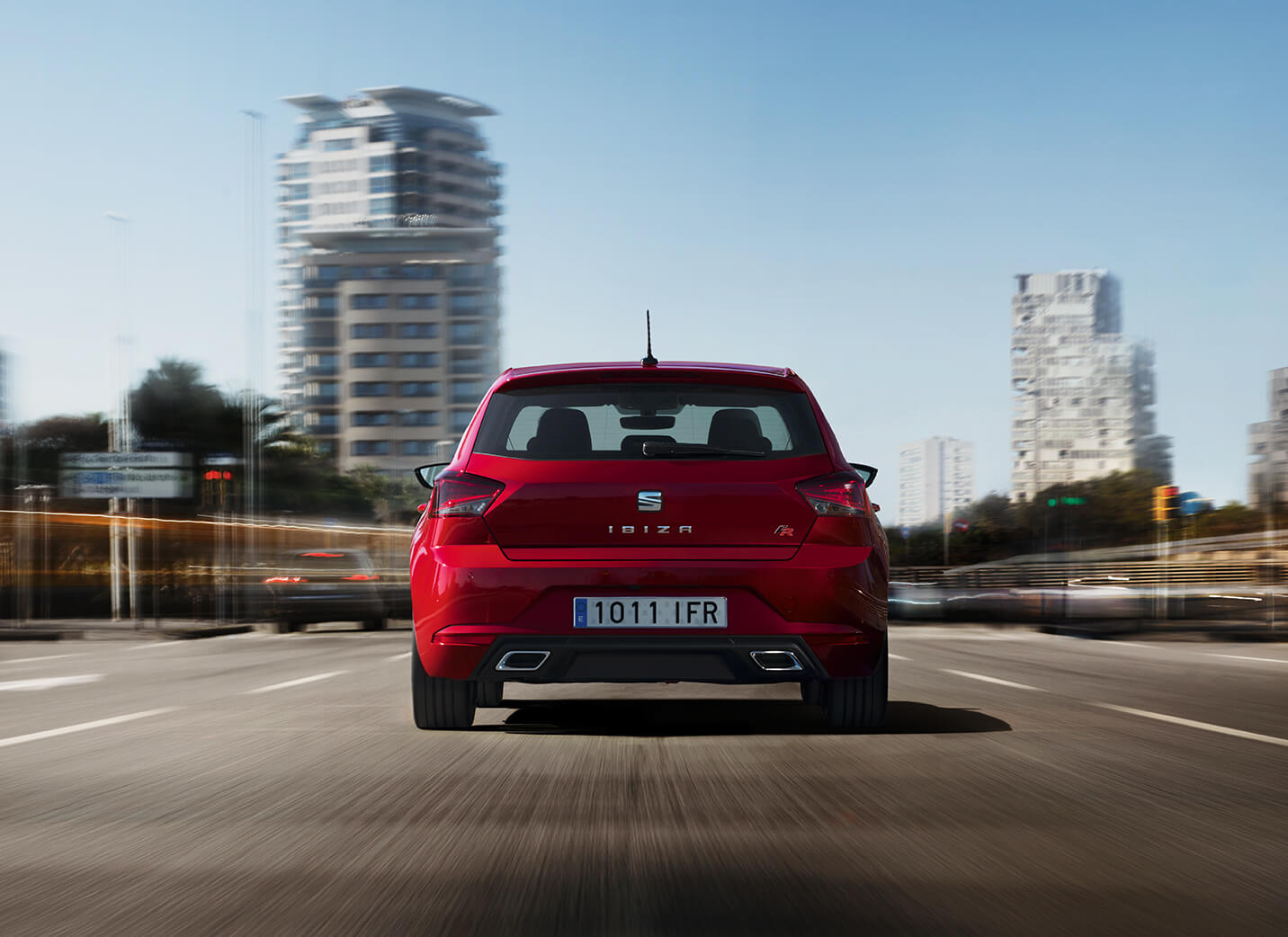 SEAT Service and maintenance - Rear view of a SEAT Ibiza hatchback city car driving